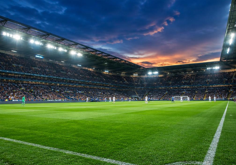 Illustrative football stadium at dusk